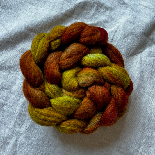"Pumpkin" 4 oz. Grey Corriedale Combed Top